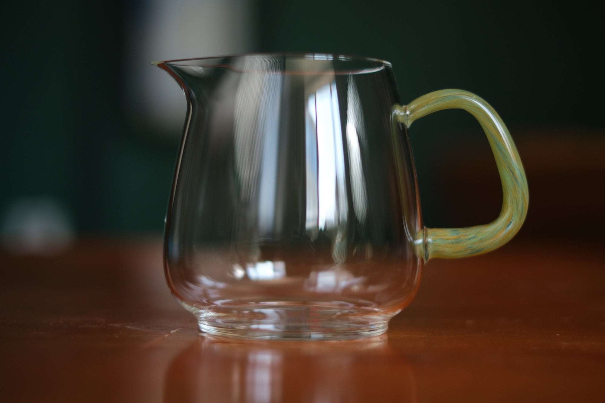 Glass pitcher - green handle