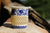 tea in a blue ceramic pitcher